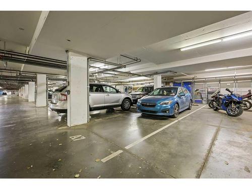 6208-151 Legacy Main Street Se, Calgary, AB - Indoor Photo Showing Garage