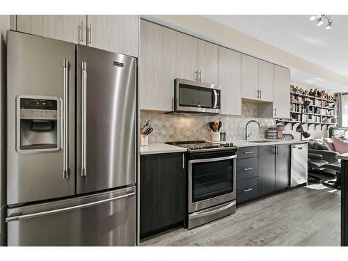 6208-151 Legacy Main Street Se, Calgary, AB - Indoor Photo Showing Kitchen With Stainless Steel Kitchen With Upgraded Kitchen