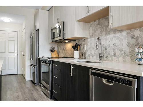 6208-151 Legacy Main Street Se, Calgary, AB - Indoor Photo Showing Kitchen With Stainless Steel Kitchen With Upgraded Kitchen