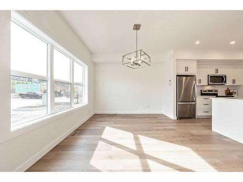 905-525 River Heights Drive, Cochrane, AB - Indoor Photo Showing Kitchen