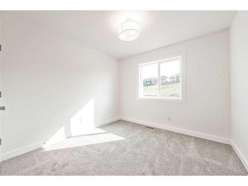 905-525 River Heights Drive, Cochrane, AB - Indoor Photo Showing Other Room