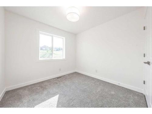 905-525 River Heights Drive, Cochrane, AB - Indoor Photo Showing Other Room