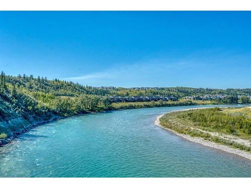 905-525 River Heights Drive, Cochrane, AB - Outdoor With Body Of Water With View