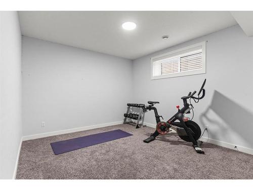 61 Creekstone Square Sw, Calgary, AB - Indoor Photo Showing Gym Room