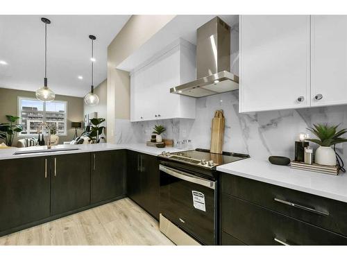 213-595 Mahogany Road Se, Calgary, AB - Indoor Photo Showing Kitchen With Upgraded Kitchen