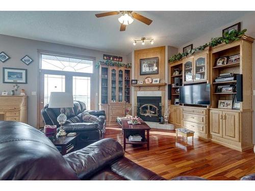 331067 Rge. Rd. 234, Rural Kneehill County, AB - Indoor Photo Showing Living Room With Fireplace