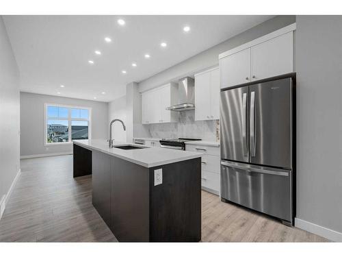 607 Mahogany Road Se, Calgary, AB - Indoor Photo Showing Kitchen With Upgraded Kitchen