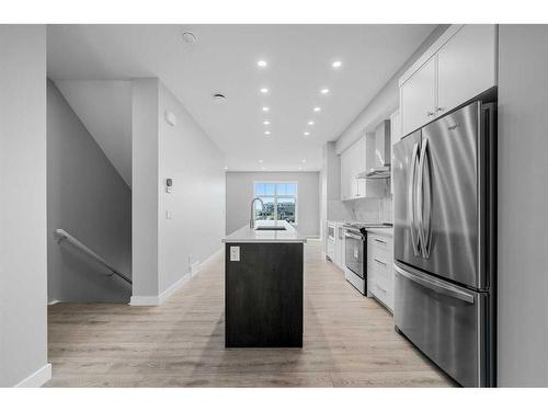 607 Mahogany Road Se, Calgary, AB - Indoor Photo Showing Kitchen With Upgraded Kitchen