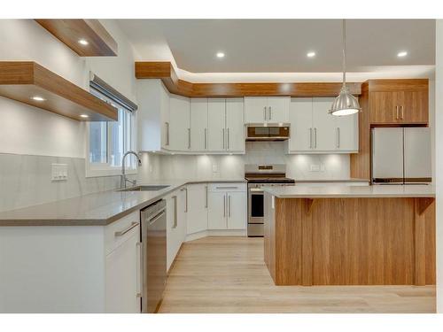 4403 26 Avenue Se, Calgary, AB - Indoor Photo Showing Kitchen With Upgraded Kitchen