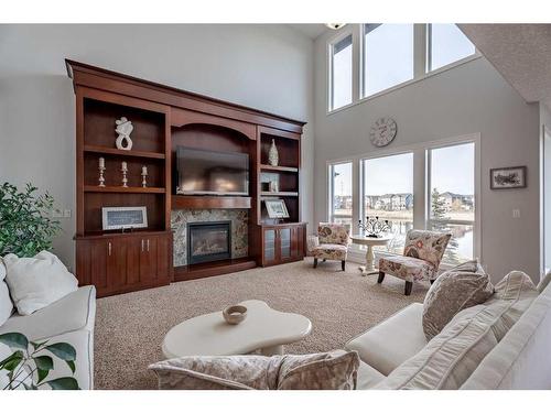 341 Rainbow Falls Way, Chestermere, AB - Indoor Photo Showing Living Room With Fireplace