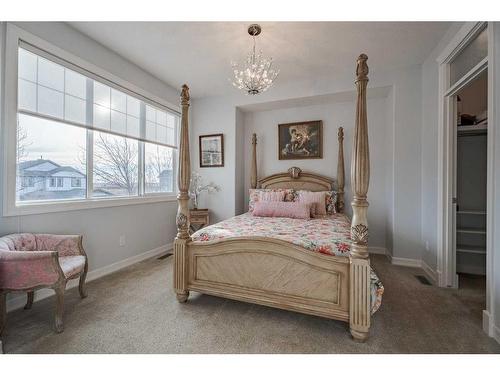 341 Rainbow Falls Way, Chestermere, AB - Indoor Photo Showing Bedroom