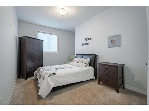 341 Rainbow Falls Way, Chestermere, AB - Indoor Photo Showing Bedroom