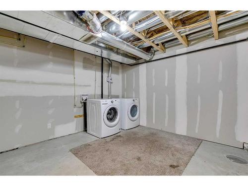 148 Sage Bluff Circle Nw, Calgary, AB - Indoor Photo Showing Laundry Room