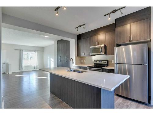 148 Sage Bluff Circle Nw, Calgary, AB - Indoor Photo Showing Kitchen With Stainless Steel Kitchen With Double Sink With Upgraded Kitchen