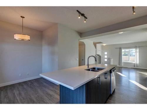 148 Sage Bluff Circle Nw, Calgary, AB - Indoor Photo Showing Kitchen With Double Sink