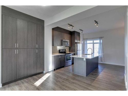 148 Sage Bluff Circle Nw, Calgary, AB - Indoor Photo Showing Kitchen With Stainless Steel Kitchen