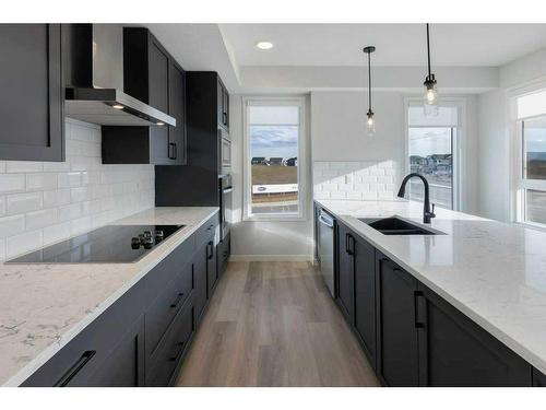 3115-33 Carringham Gate Nw, Calgary, AB - Indoor Photo Showing Kitchen With Double Sink With Upgraded Kitchen