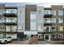 3115-33 Carringham Gate Nw, Calgary, AB  - Outdoor With Facade 