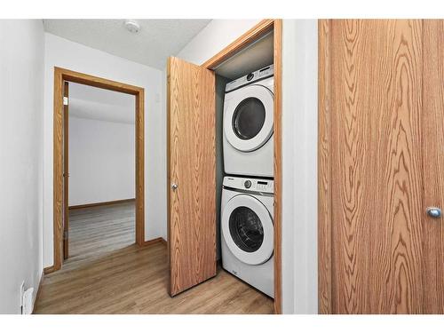 603 Country Village Cape Ne, Calgary, AB - Indoor Photo Showing Laundry Room