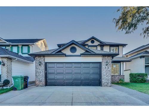 59 Douglas Shore Close Se, Calgary, AB - Outdoor With Facade