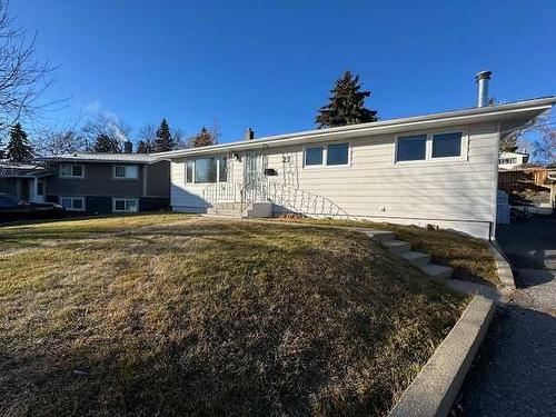 21 Healy Drive Sw, Calgary, AB - Outdoor