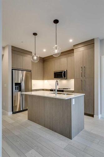 1118-395 Skyview Parkway Ne, Calgary, AB - Indoor Photo Showing Kitchen With Upgraded Kitchen