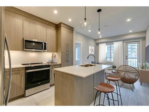 1118-395 Skyview Parkway Ne, Calgary, AB - Indoor Photo Showing Kitchen With Double Sink With Upgraded Kitchen