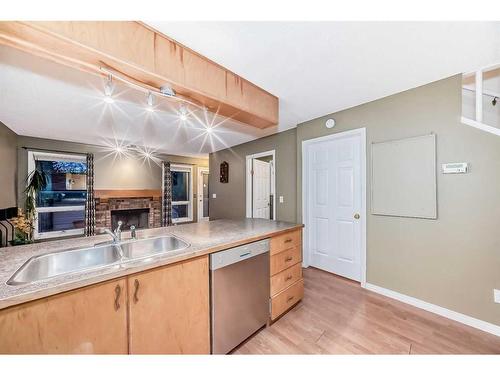 219 Coachway Road Sw, Calgary, AB - Indoor Photo Showing Kitchen With Double Sink