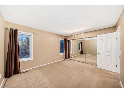 219 Coachway Road Sw, Calgary, AB - Indoor Photo Showing Other Room