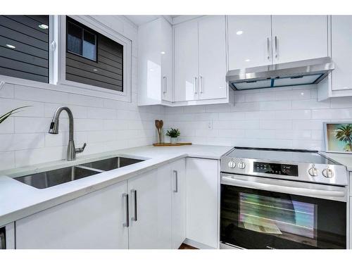 8332 Centre Street Ne, Calgary, AB - Indoor Photo Showing Kitchen With Double Sink With Upgraded Kitchen