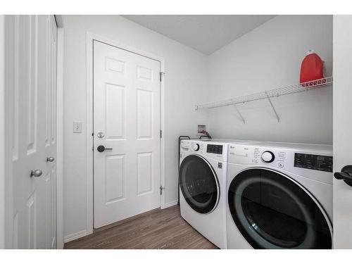 298 Arbour Crest Drive Nw, Calgary, AB - Indoor Photo Showing Laundry Room