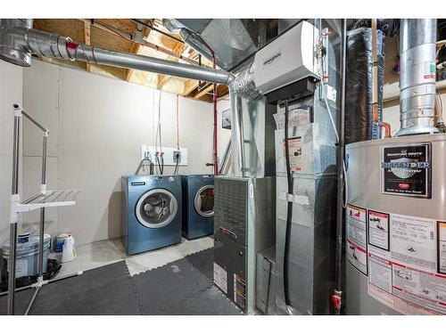 298 Arbour Crest Drive Nw, Calgary, AB - Indoor Photo Showing Laundry Room