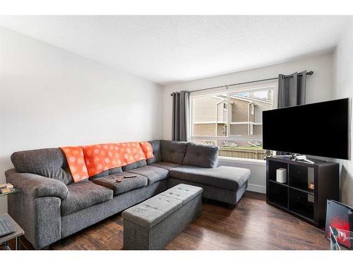 34-3032 Rundleson Road Ne, Calgary, AB - Indoor Photo Showing Living Room