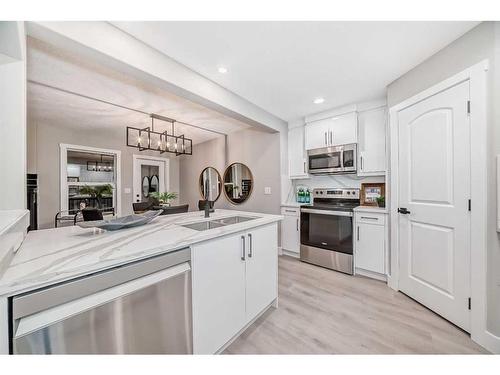 281 Cranberry Close Se, Calgary, AB - Indoor Photo Showing Kitchen With Stainless Steel Kitchen