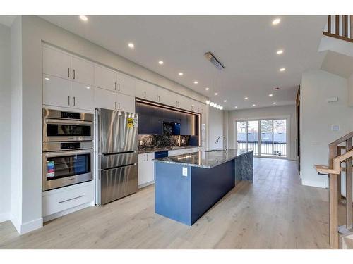 2430 26 Avenue Nw, Calgary, AB - Indoor Photo Showing Kitchen With Stainless Steel Kitchen With Upgraded Kitchen