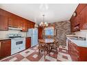 11 Beaupre Crescent Nw, Calgary, AB  - Indoor Photo Showing Kitchen With Double Sink 