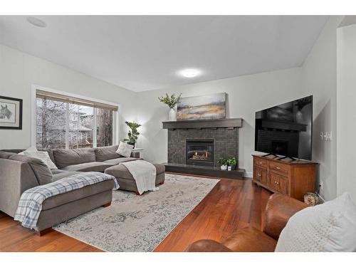 97 Mahogany Square Se, Calgary, AB - Indoor Photo Showing Living Room With Fireplace