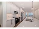 2409-395 Skyview Parkway Ne, Calgary, AB  - Indoor Photo Showing Kitchen With Stainless Steel Kitchen With Double Sink With Upgraded Kitchen 