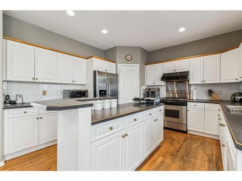 125 Evergreen Place Sw, Calgary, AB - Indoor Photo Showing Kitchen With Double Sink