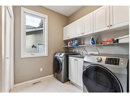 125 Evergreen Place Sw, Calgary, AB - Indoor Photo Showing Laundry Room