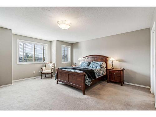 125 Evergreen Place Sw, Calgary, AB - Indoor Photo Showing Bedroom