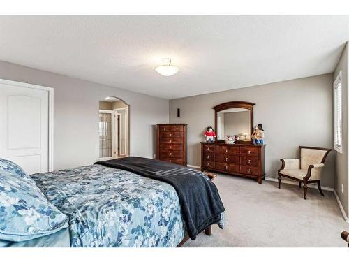 125 Evergreen Place Sw, Calgary, AB - Indoor Photo Showing Bedroom