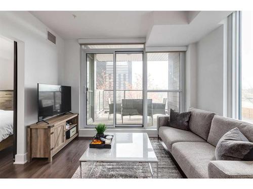 224-619 Confluence Way Se, Calgary, AB - Indoor Photo Showing Living Room