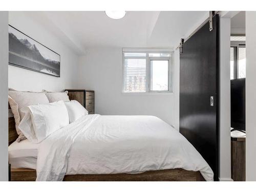 224-619 Confluence Way Se, Calgary, AB - Indoor Photo Showing Bedroom