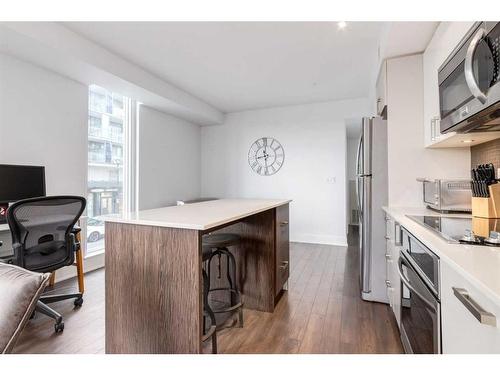 224-619 Confluence Way Se, Calgary, AB - Indoor Photo Showing Kitchen