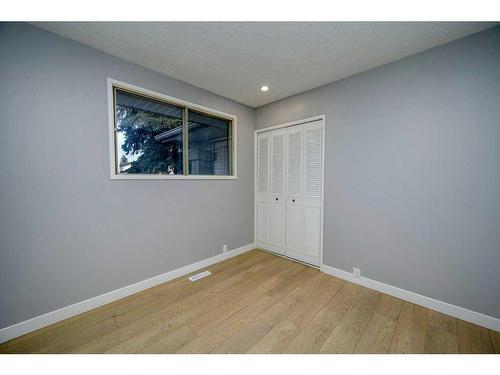 700 Woodpark Boulevard Sw, Calgary, AB - Indoor Photo Showing Other Room