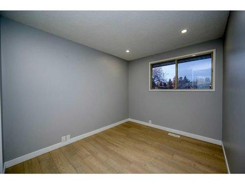 700 Woodpark Boulevard Sw, Calgary, AB - Indoor Photo Showing Other Room