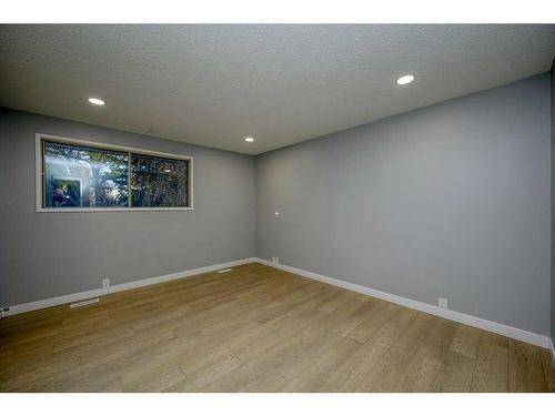 700 Woodpark Boulevard Sw, Calgary, AB - Indoor Photo Showing Other Room