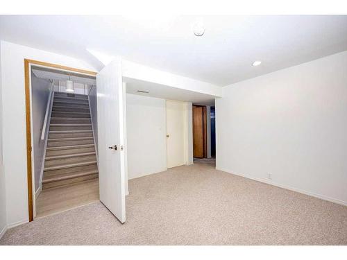 700 Woodpark Boulevard Sw, Calgary, AB - Indoor Photo Showing Other Room