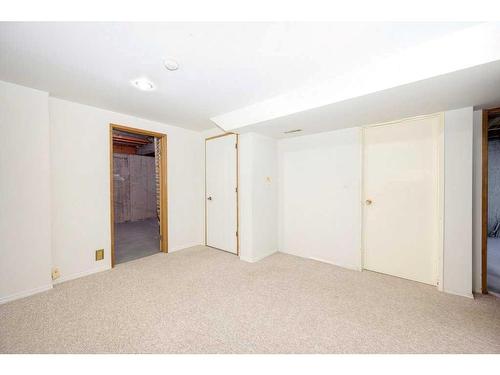 700 Woodpark Boulevard Sw, Calgary, AB - Indoor Photo Showing Other Room